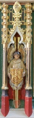 Angel with St Luke's symbol on the reredos St Marie's Cathedral's Sanctuary