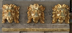 Lions' heads on the wall supporting the bell tower of St Marie's Cathedral